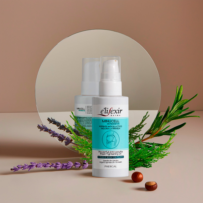 escenario-espejo-frontal-D Aceite anticelulitico minucell intensive junto a un espejo y sus ingredentes principales